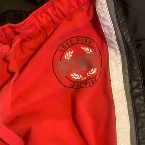 Red and blackwhite and grey striped joggers